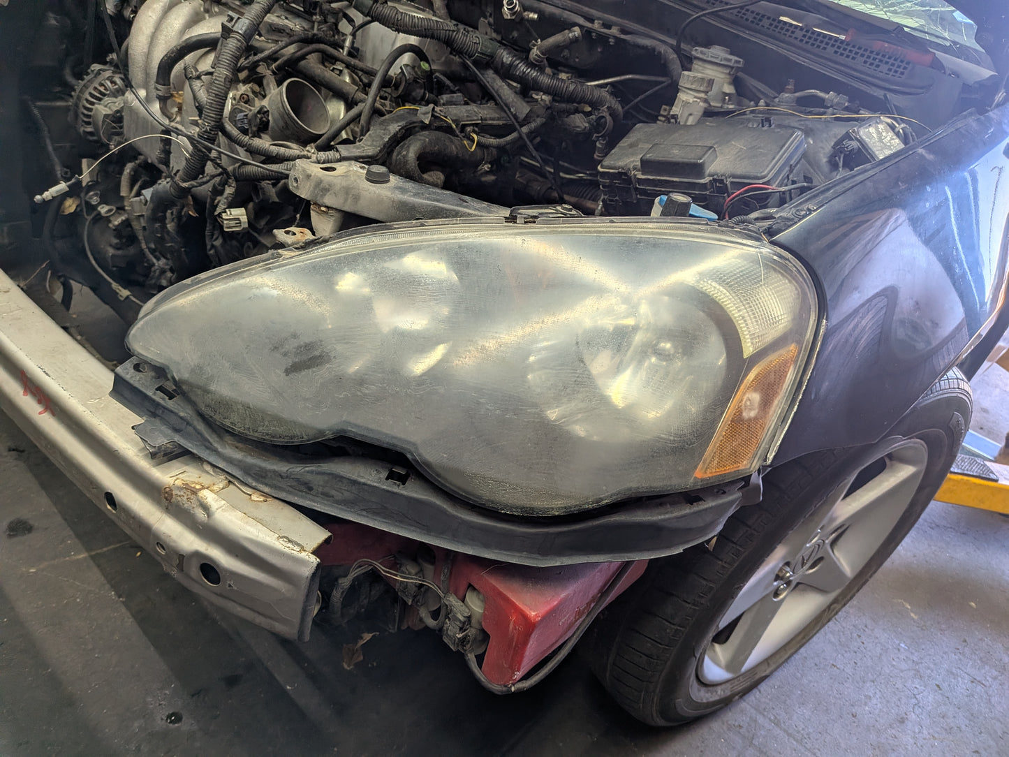 02-04 RSX type s driver side headlight "used"